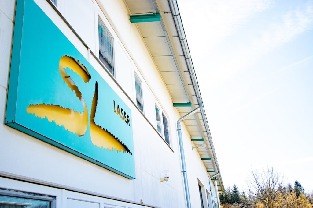 SL laser logo on exterior wall