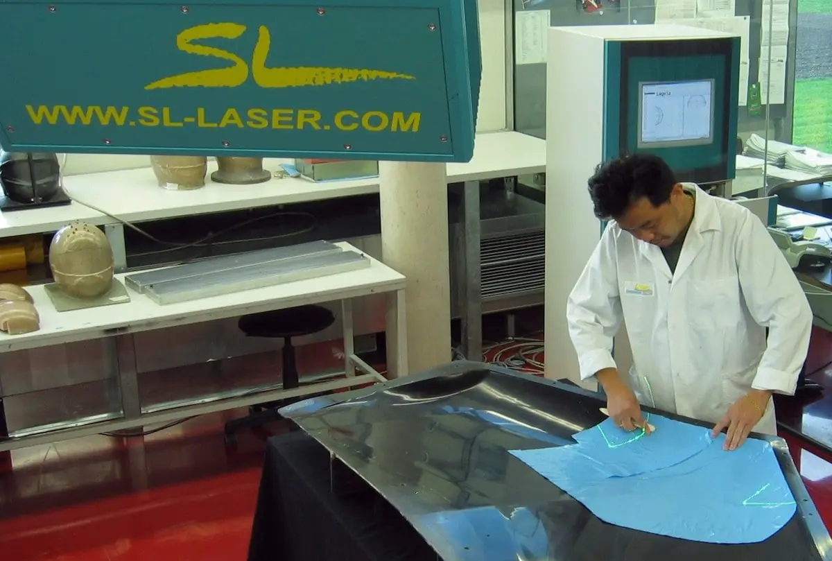 Man in form construction with precise laser projection Aircraft industry - Boat building
